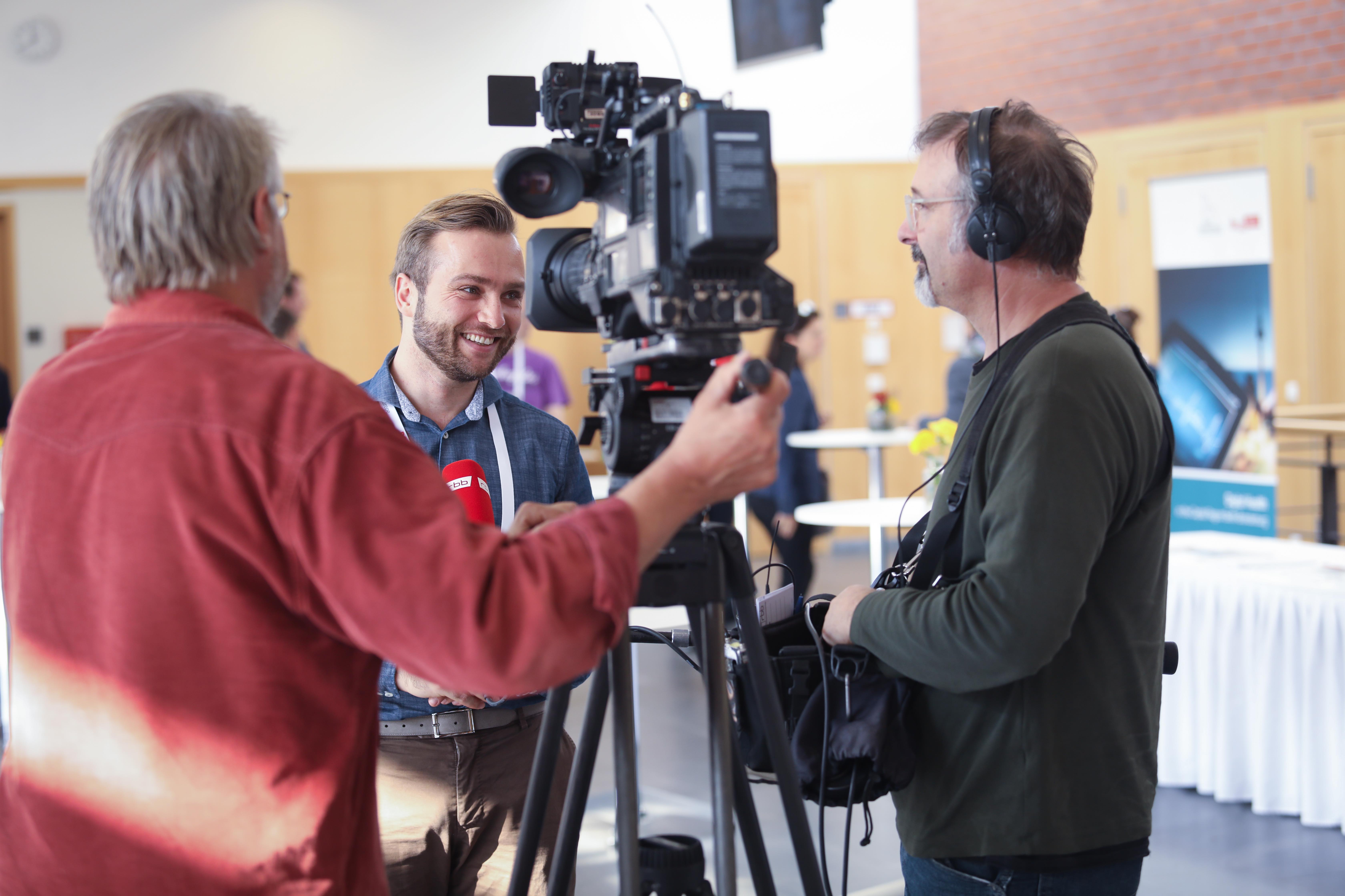 Sven Jungmann being interviewed